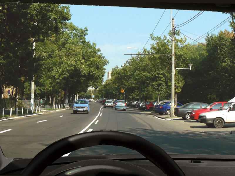 Are you permitted to cross over the longitudinal marking in the image?