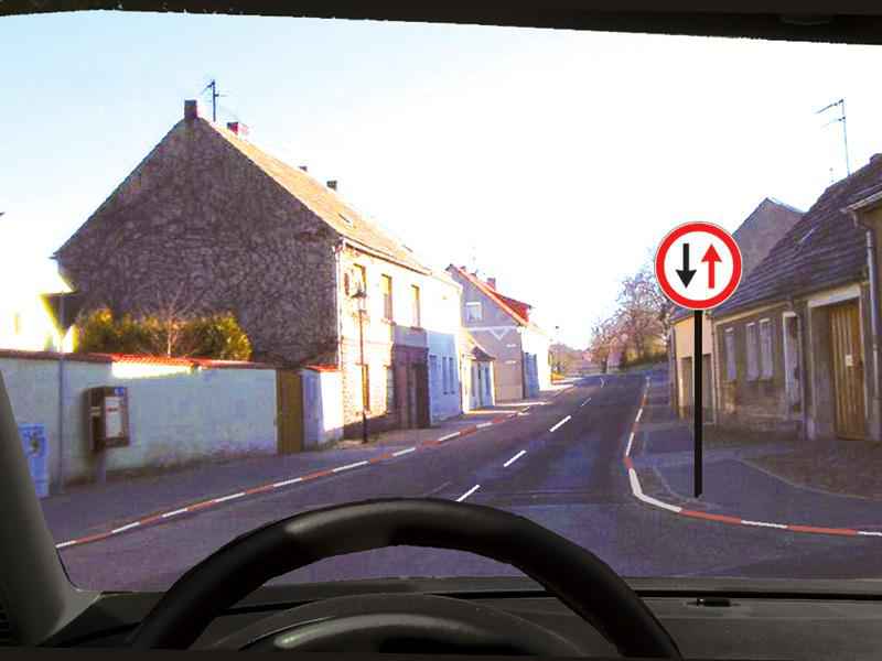 In the given situation, do you have priority over the vehicles that move from the opposite direction?